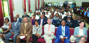 Officials and others at the service