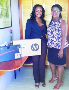 Ms. Roxanne Webster of Digicel and  Ms. Dorn Henry of Zenaida Haven