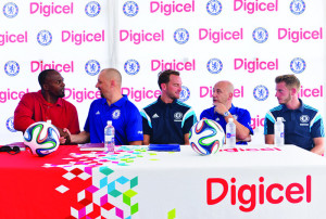 Mr Haydn Hughes with Digicel personnel and Chelsea Coaches