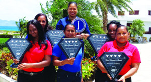 Some of the Sheriva staff members proudly display the 2011 – 2015 AAA Four Diamond Awards and other award.