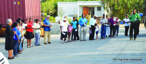 Pastor Philip Gumbs (far right) commences pray walk