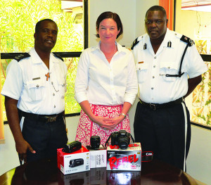 Sgt. Chrispen Gumbs, Gov. Scott and Commissioner Proctor