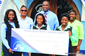 Ms. Jennifer Gumbs(centre), other members of the Cancer Society, Mr. David Gumbs and others from ANGLEC