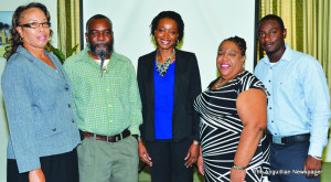 Ms. Melissa Meade(centre) and Staff from the Department of Disaster Management