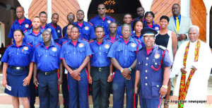 Ministers Curtis Richardson, Cora Richardson-Hodge and Canon Samuel Knight with Fire Officers