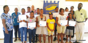 Students with Mr. Winston Duncan (right) and Soroptimist members