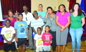 Mrs. Rhonda Connor, Mrs. Hyacinth Bradley and Ms. Rebecca Haskins (far right)  with North Hill residents