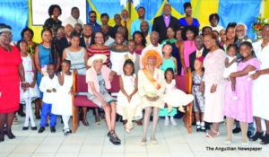 Mrs. Richardson surrounded by family, friends and clergy