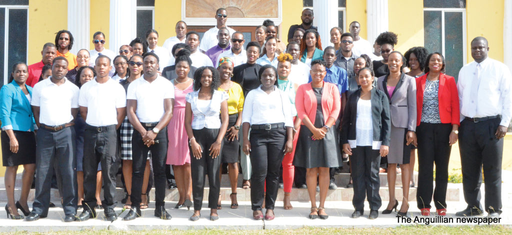 Deputy Governor Mr. Perin Bradley (far right) with Public Administration personnel and new employees