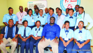 Course Facilitator Mr. Collin Cleare (far left) and Mr. Sherman Williams (centre)  with participants