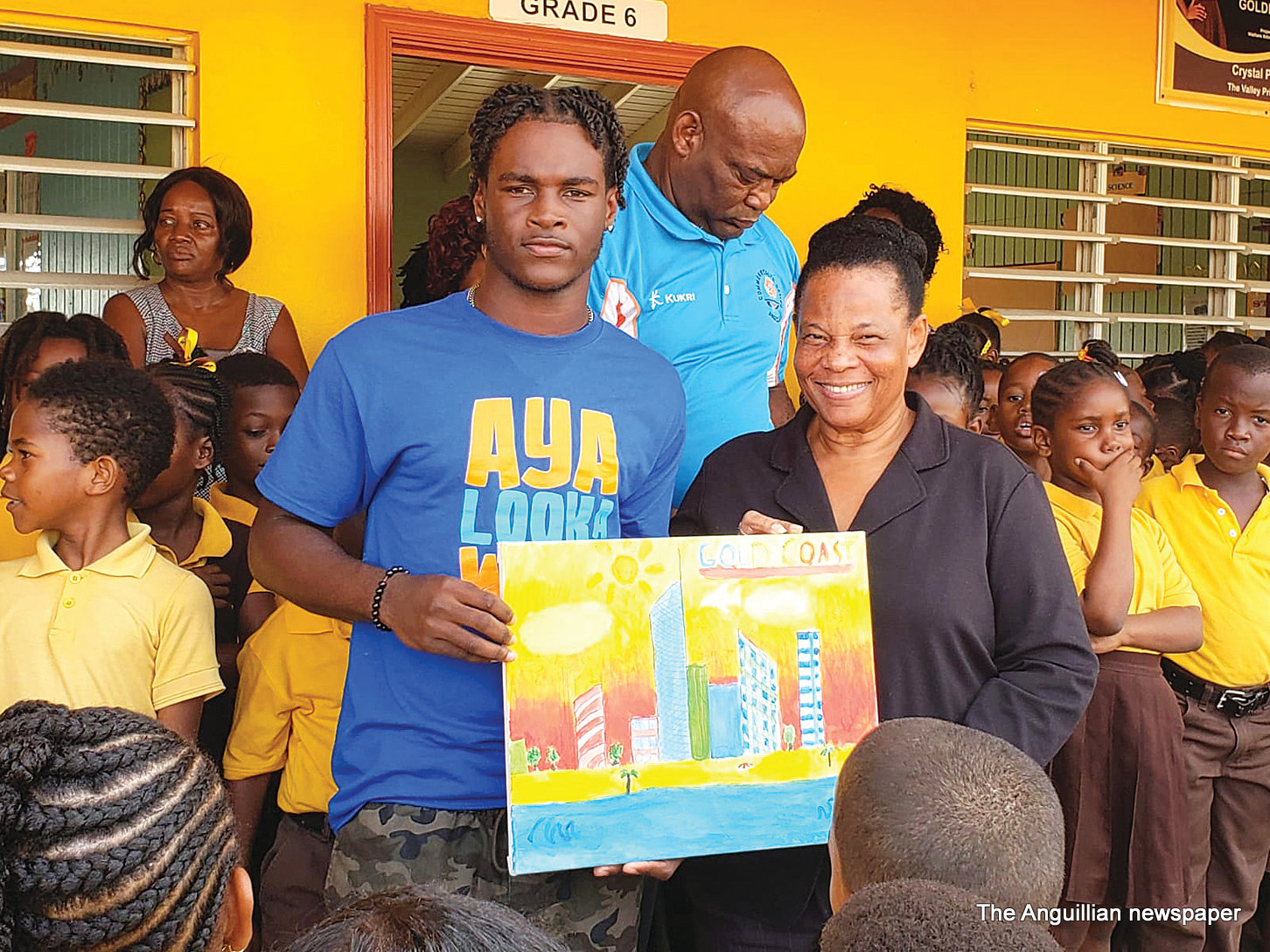 PRESENTATION OF PAINTINGS FROM PRIMARY SCHOOL IN AUSTRALIA TO ANGUILLA’S SCHOOLS
