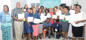 Reverend Lindsay Richardson (2nd to left) and trained volunteers