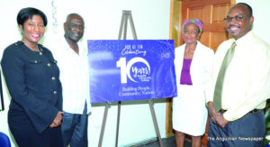 L-R Minister Cora Richardson-Hodge, Mr. Rodney Rey, Mrs. Rhona Richardson-Roydon and Dr. Karl Dawson