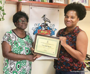 Mrs Arlene Browne Richardson making the presentation to Nurse Brooks