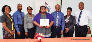 Ms. Codisha Webster (centre) Recipient of the 2018-2019 Julian R. Harrigan Memorial Scholarship with University, Committee and Harrigan Family Reps