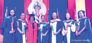 UWI Open Campus Anguilla Graduates Trevor Queeley, Shirba Hughes, Meredith Connor, Marcia Brooks, Vanisha Proctor and Kemoloy Murphy  with Dr. Phyllis Fleming-Banks at Graduation in St. Lucia