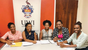 UWI Open Campus Guild Executive Members Charlene Roach and Melissa Harrigan, Guild Chair - STAT Ambassador Kemoloy Murphy and UWI Staff Members Tesia Harrigan and Arlene Browne Richardson