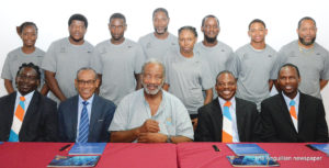 President Raymond Guishard (centre) with facilitators and coaches