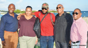 L-R: Mr. Cardigan Connor, Mother of Hasani Hennis, Mr. Hasani Hennis, Chief Minister Victor Banks and Mr. André Collins