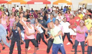 Educators exercising at the Rodney MacArthur Rey Auditorium