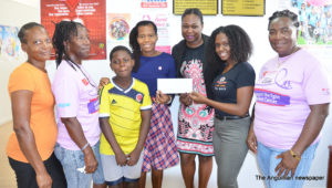 (Centre) L-R Mrs. Jennifer Gumbs, Ms. Kemoloy Murphy,  Ms. Melissa Harrigan and others