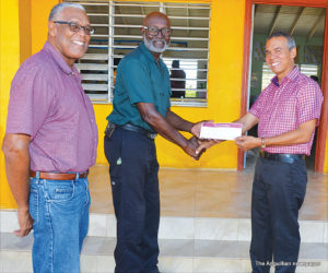 L-R: Mr. Valentine Banks, Mr. Elkin Lloyd and Principal Michael Skellekie