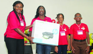 Rtn. Grace Linger -  Chairperson of Spelling Bee 2018, Carolyn Richardson-Hodge - President of the Rotary Club of Anguilla, First and Second place winners - Ayana Carty and Zakkai Lake 