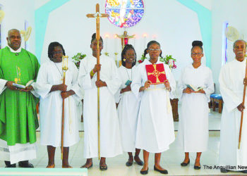 REV. CHRISTIAN RECOGNISES YOUNG PEOPLE AT CHURCH