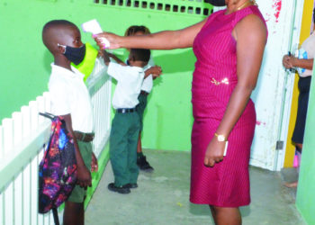 SCHOOLS REOPEN AFTER COVID CLUSTER THREAT SUBSIDES