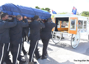 HONOURABLE HUBERT BENJAMIN HUGHES LAID  TO REST AFTER OFFICIAL FUNERAL