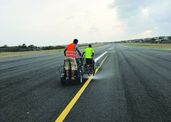 MARKINGS COMPLETE AIRPORT RUNWAY RESURFACING