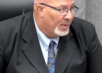 MINISTER OF LABOUR KENNETH HODGE PRESENTS NATIONAL MINIMUM WAGE MOTION TO PARLIAMENT